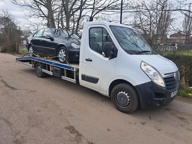 Scrap car bought and loaded onto a recovery truck in Carlisle